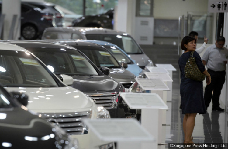 Customers at Tan Chong Motor showroom, a distributor for Nissan cars, on Jan 6, 2016.